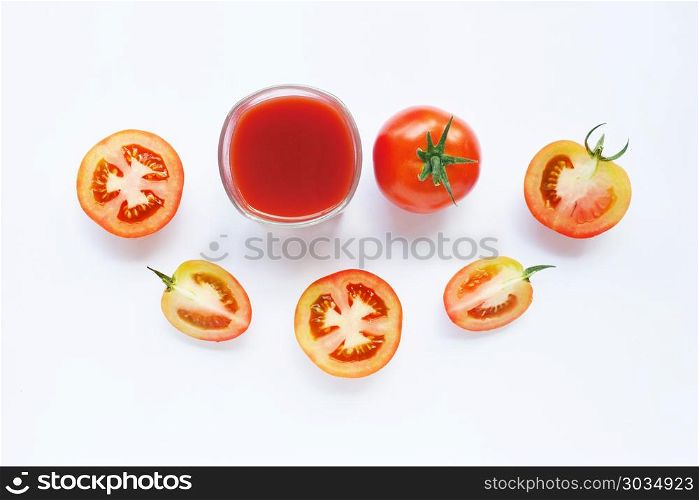 Healthy Drinks. Glass of tomato juice and pieces of fresh tomato. Healthy Drinks. Glass of tomato juice and pieces of fresh tomato isolated on white background.