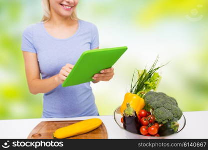 healthy eating, cooking, vegetarian food, technology and people concept - close up of smiling young woman with tablet pc computer and bowl of vegetables over green natural background