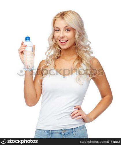 healthy eating, diet and people concept - happy beautiful young woman holding bottle of water. happy beautiful young woman with bottle of water