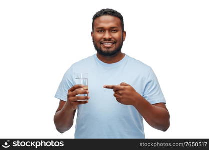 healthy eating, diet and people concept - happy smiling african american man showing glass of water over white background. happy african american man with glass of water