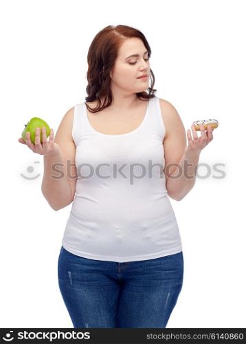 healthy eating, junk food, diet and choice people concept - plus size woman choosing between apple and cookie