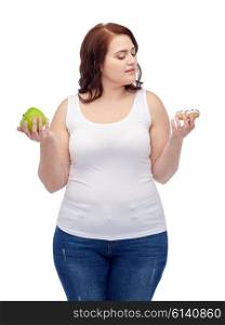 healthy eating, junk food, diet and choice people concept - plus size woman choosing between apple and cookie