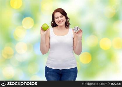 healthy eating, junk food, diet and choice people concept - smiling plus size woman choosing between apple and cookie over green lights background