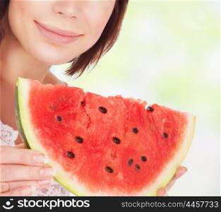 Healthy eating lifestyle, beautiful woman eating watermelon outdoors, face part, enjoying fresh red ripe fruit, sweet tasty juicy summertime dessert