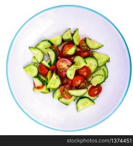 Healthy eating. Light dietary salad of fresh cucumbers and tomatoes. Studio Photo. Healthy eating. Light dietary salad of fresh cucumbers and tomatoes