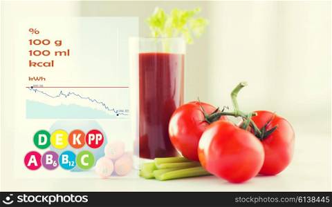 healthy eating, organic food and diet concept - close up of fresh tomato juice glass and vegetables on table with calories and vitamin chart