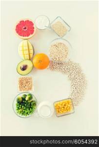 healthy eating, vegetarian food, diet and culinary concept - close up of food ingredients in letter b shape
