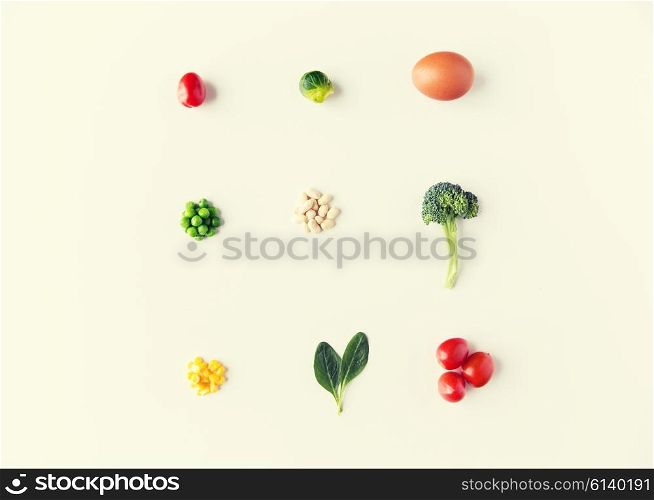 healthy eating, vegetarian food, diet and culinary concept - close up of ripe vegetables and food over white