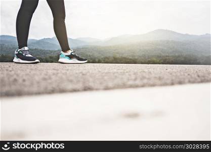 Healthy fitness athlete woman jogging at a outdoor park