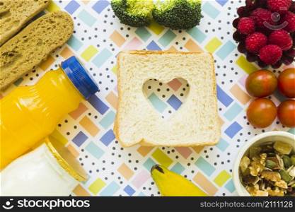 healthy food around toast with heart
