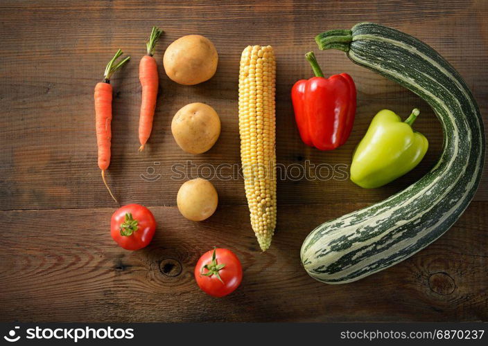 Healthy food background . studio photography of different vegetables on old wooden table