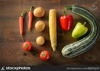 Healthy food background . studio photography of different vegetables on old wooden table