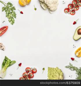 Healthy food background. Various fresh salad vegetables ingredients on white , top view, frame. Layout for Detox, dieting and clean eating