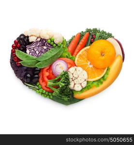 Healthy food concept of a human heart made of vegetable and fruit mix that reduce death risk, isolated on white.