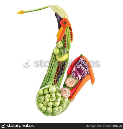 Healthy food concept of classical wind instrument saxophone made of fresh vegetables full of vitamins, isolated on white.
