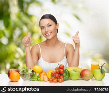 healthy food concept - woman with fresh fruits and vegetables showing thumbs up