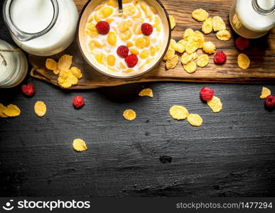 Healthy food. Cornflakes with milk and berries.. Cornflakes with milk and berries.