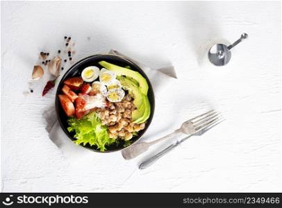 Healthy food. Dietary salad with spinach, quail eggs and nuts. Keto diet. Keto Salad