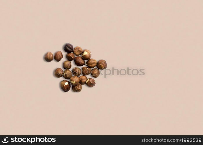 Healthy food for background image close up almond nuts. Texture on white grey table top view.