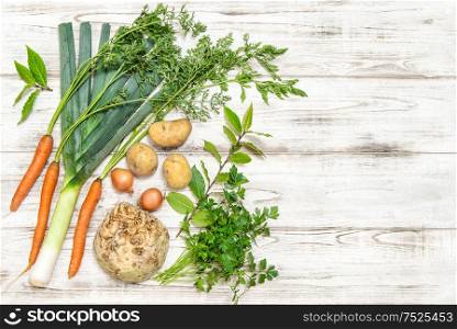 Healthy food. Fresh organic vegetables on wooden background