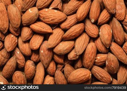 Healthy food, good for heart health. Almonds as background.