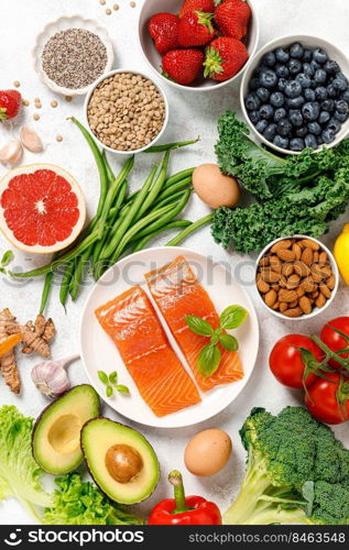 Healthy food. Healthy eating background. Salmon, fruit, vegetable and  berry. Superfood