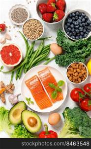 Healthy food. Healthy eating background. Salmon, fruit, vegetable and  berry. Superfood