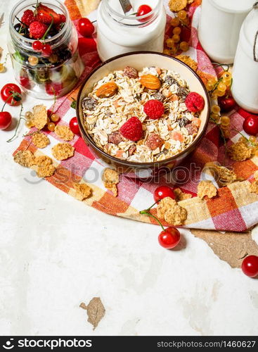 Healthy food. Muesli with forest wild berries. On rustic background.. Healthy food. Muesli with forest wild berries.