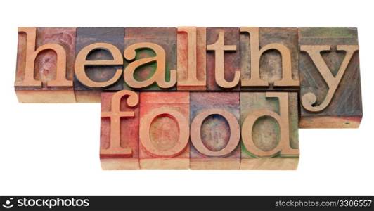 healthy food phrase in vintage wood letterpress printing blocks, isolated on white