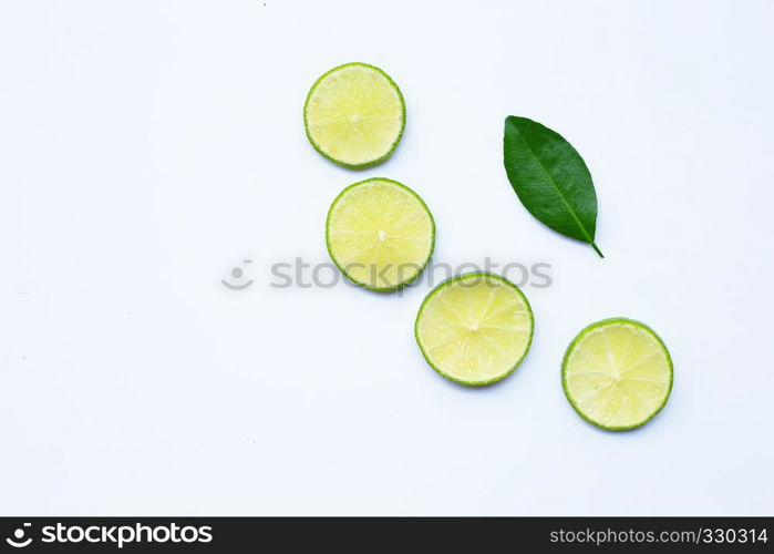 Healthy food. sliced lime isolated on white background. Copy space