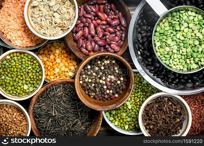 Healthy food. Variety of legumes. On a wooden background.. Healthy food. Variety of legumes.