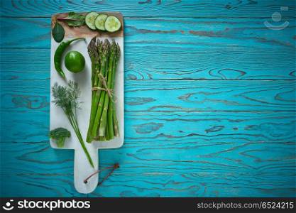 Healthy food vegetables for heart heath on wooden turquoise background. Healthy food vegetables for heart heath on wood