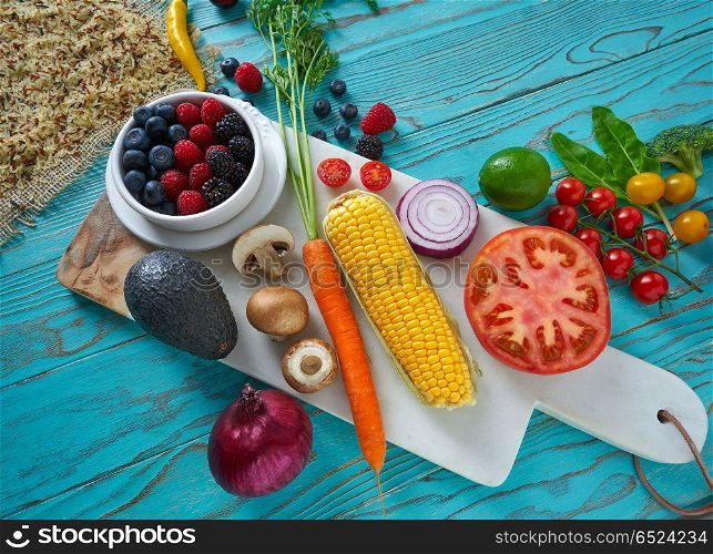 Healthy food vegetables for heart heath on wooden turquoise background. Healthy food vegetables for heart heath on wood
