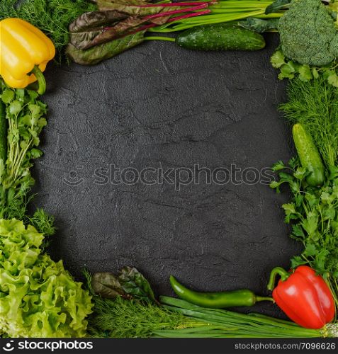 Healthy food. Vegetables On a black wooden background