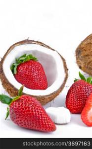healthy fresh fruits - strawberries and coconut isolated on white background