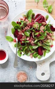 Healthy fresh salad. Beetroot, red chard and canned tuna salad. Healthy Meal recipe preparation. Plant-based dishes. Green living. Vegetarian recipes. Food styling. Organic food. Vegetarian cuisine