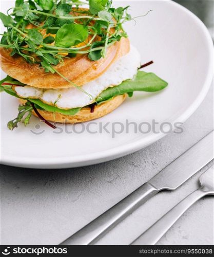 Healthy freshly baked bagel with egg