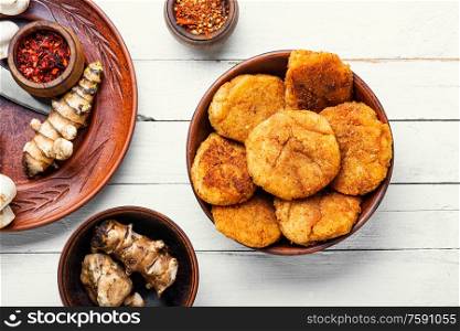 Healthy fried vegetable cutlets with Jerusalem artichoke and mushrooms. Healthy vegetable cutlets
