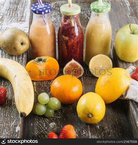 healthy fruits around smoothie