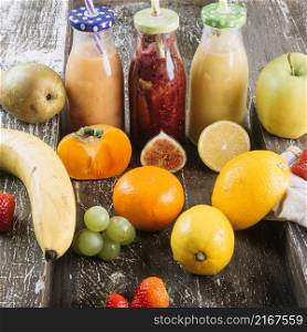 healthy fruits around smoothie