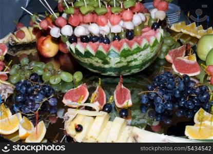 Healthy fruits on the mirror table