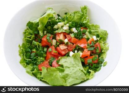 Healthy green salad, in white bowl. Isolated on white.