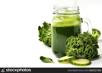 Healthy green smoothie and ingredients on white - superfoods, detox, diet, health, vegetarian food concept. Background layout with free text space.