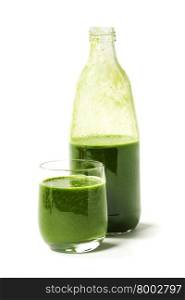 Healthy green smoothie on white - superfoods, detox, diet, health, vegetarian food concept