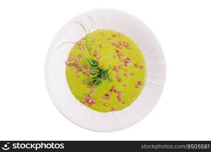 Healthy green soup on white plate
