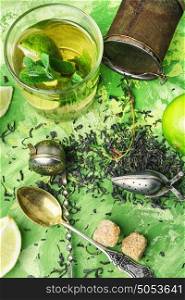 healthy herbal tea. Dry tea leaves,fresh thyme,lime fruit for tea