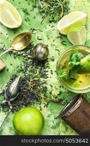 healthy herbal tea. Dry tea leaves,fresh thyme,lime fruit for tea