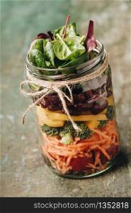 Healthy Homemade Mason Jar Salad with Beans and Veggies - Healthy food, Diet, Detox, Clean Eating or Vegetarian concept. Healthy Homemade Mason Jar Salad, healthy food