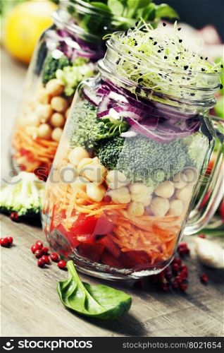 Healthy Homemade Mason Jar Salad with Chickpea and Veggies - Healthy food, Diet, Detox, Clean Eating or Vegetarian concept