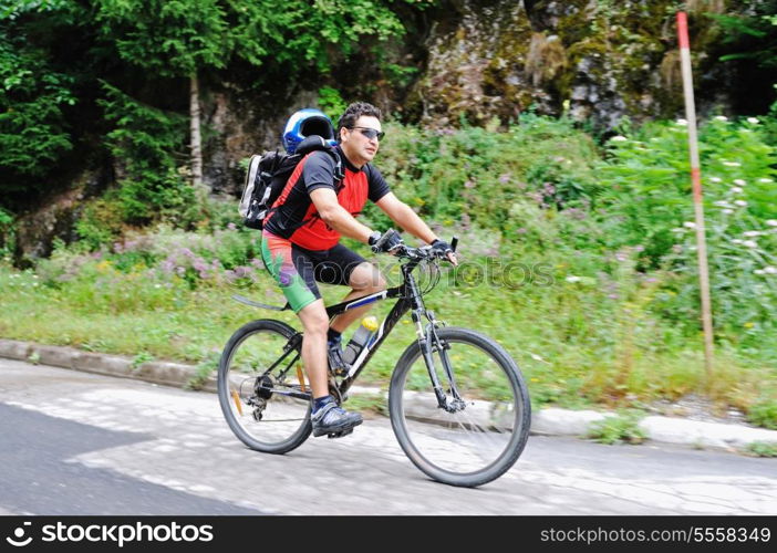 healthy lifestyle and fitness concept with mount bike man outdoor